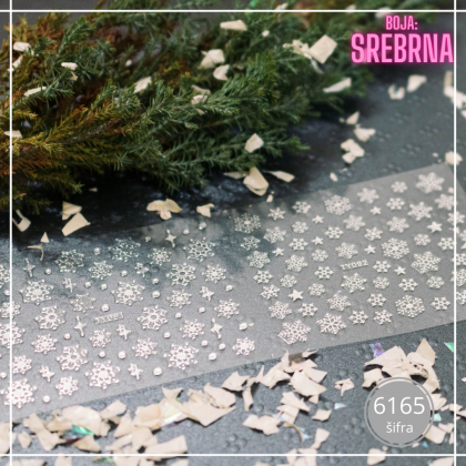 Zimska nalepnica za nokte sa motivima pahulja i zimskih detalja. Laka primena, profesionalan izgled i savršen manikir u prazničnom duhu.